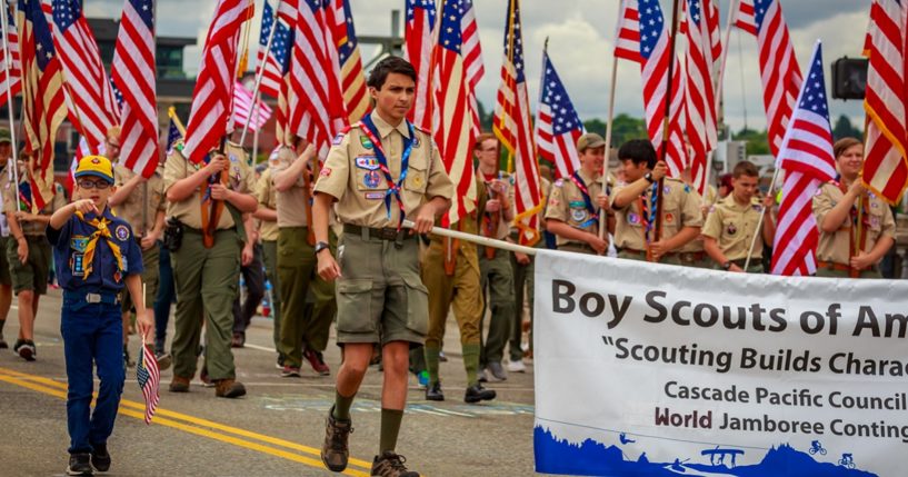 Scouts from Boy Scouts of America take part in the Grand Floral Parade, during Portland, Oregon, Rose Festival in 2019.