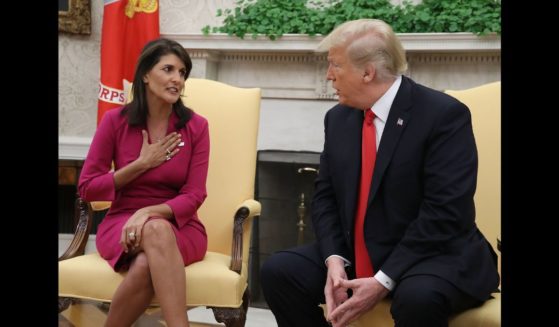 Then-U.S. President Donald Trump announces that he has accepted the resignation of Nikki Haley as US Ambassador to the United Nations, in the Oval Office on October 9, 2018 in Washington, DC.