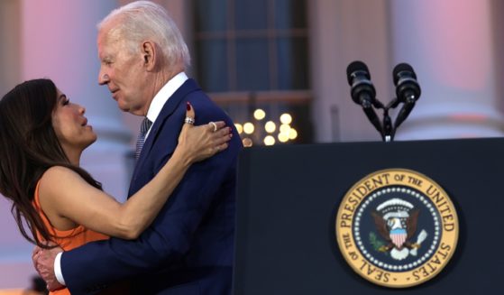 President Joe Biden hugs film director Eva Longoria during a screening of the film “Flamin’ Hot” on the South Lawn of the White House on June 15, 2023.