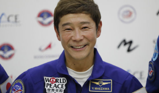Japanese billionaire Yusaku Maezawa is seen at a 2021news conference ahead of the expedition to the International Space Station. Maezawa said Saturday he has cancelled his planned flight around the moon on a Space X spaceship because of uncertainty about when it may be possible.