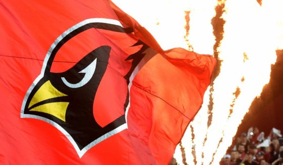 The Arizona Cardinals logo is seen on a flag before the team faces the Green Bay Packers at University of Phoenix Stadium on January 16, 2016 in Glendale, Arizona.