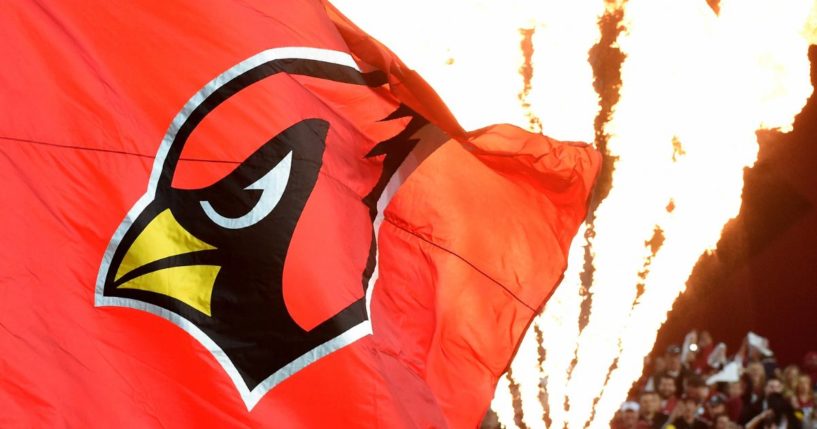 The Arizona Cardinals logo is seen on a flag before the team faces the Green Bay Packers at University of Phoenix Stadium on January 16, 2016 in Glendale, Arizona.