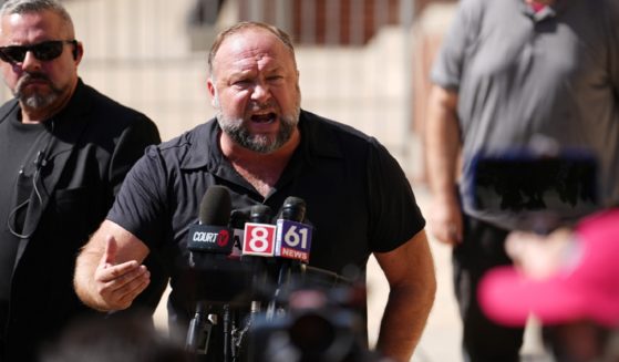InfoWars founder Alex Jones speaks to the media outside Waterbury Superior Court Sept. 21, 2022, during his defamation trial on September 21, 2022 in Waterbury, Connecticut.