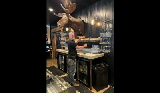 This Facebook screen shot shows an employee at the Old State Saloon in Eagle, Idaho.