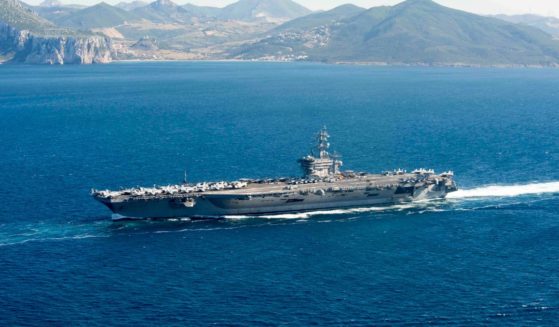 In this handout provided by the U.S. Navy, the aircraft carrier USS Dwight D. Eisenhower (CVN 69) transits the Strait of Gibraltar June 13, 2016 into the Mediterranean Sea.