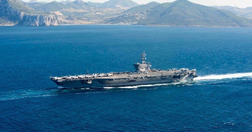 In this handout provided by the U.S. Navy, the aircraft carrier USS Dwight D. Eisenhower (CVN 69) transits the Strait of Gibraltar June 13, 2016 into the Mediterranean Sea.