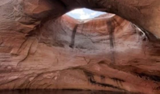 The Double Arch at Lake Powell in Arizona is pictured before its collapse on Aug. 8.