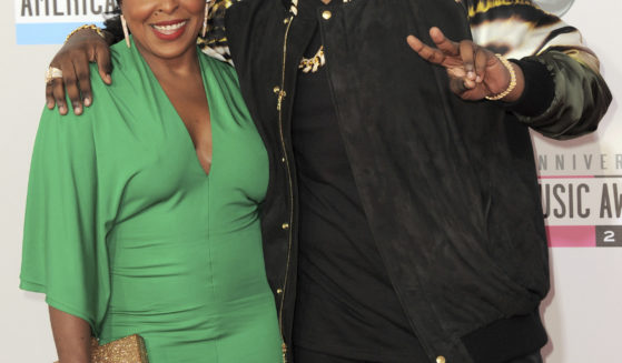 Sean Kingston, right, and his mother Janice Turner arrive at the 40th anniversary American Music Awards, November 18, 2012, in Los Angeles.