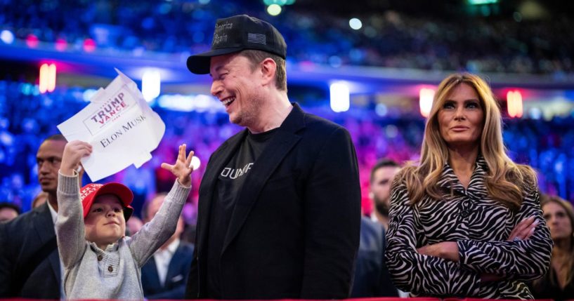 Elon Musk and former first lady Melania Trump listen as Republican presidential nominee former President Donald Trump speaks at a campaign rally at Madison Square Garden in New York, NY on Sunday, Oct. 27, 2024.