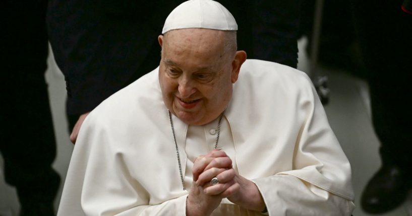 Pope Francis greets people at the end of the weekly general audience at the Vatican on Wednesday. (Filippo Monteforte - AFP / Getty Images)