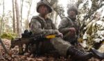 Female soldiers of the 88th Gun Battery of the British Army wait for an evening attack during the March 12 Allied Spirit 25 military exercise at the U.S. 7th Army Training Command Joint Multinational Readiness Center near Hohenfels, Germany.
