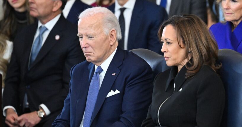 (L-R) US President Joe Biden and Vice President Kamala Harris attend the inauguration ceremony before Donald Trump is sworn in as the 47th US President in the US Capitol Rotunda in Washington, DC, on January 20, 2025.