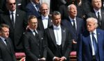 France's President Emmanuel Macron, Finland's President Alexander Stubb and U.S. President Donald Trump stand during late Pope Francis' funeral ceremony at St Peter's Square at the Vatican Saturday.