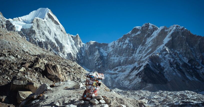 An abandoned, dented and stickered waste collection bin outside Everest Base Camp on Oct. 13, 2024, in Nepal.