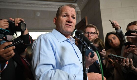 Rep. Troy Nehls (R-TX) speaks to reporters outside a GOP caucus meeting for Speaker of the House in the Longworth House Office Building on Capitol Hill on October 24, 2023 in Washington, DC.