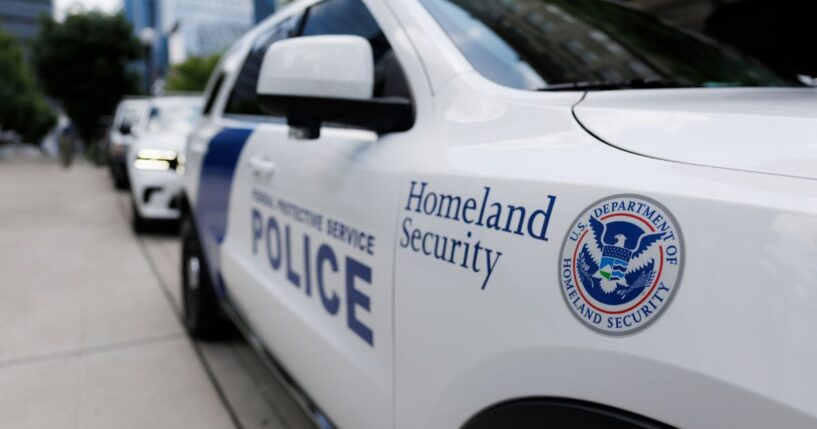 A U.S. Department of Homeland Security emblem is pictured on a police vehicle parked at Fred D Thompson Federal Building & Courthouse in Nashville, Tennessee, during a hearing regarding the release of Kilmar Abrego Garcia on Wednesday.