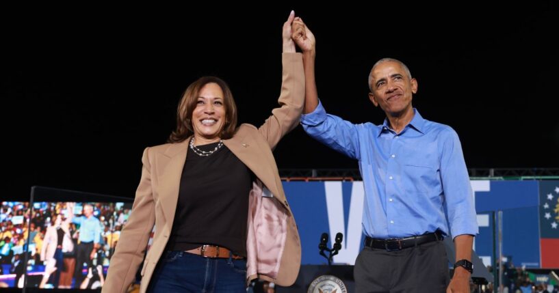 Democratic presidential nominee, Vice President Kamala Harris, campaigns with former President Barack Obama at the James R. Hallford Stadium on Oct. 24, 2024, in Clarkston, Georgia.