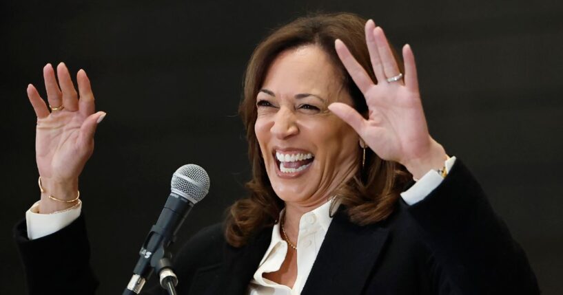 Former Vice President Kamala Harris waves her hands at the audience of the State of the People POWER Tour opening ceremony on June 6, 2025.