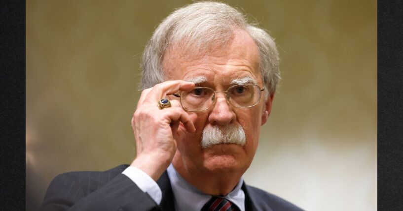 Former National Security Adviser John Bolton speaks to reporters in a file photo taken Aug. 17, 2022.