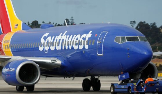 A Southwest Airlines Boeing 737 airplane is pushed back on the tarmac at San Diego International Airport in San Diego, California, on Aug. 15.