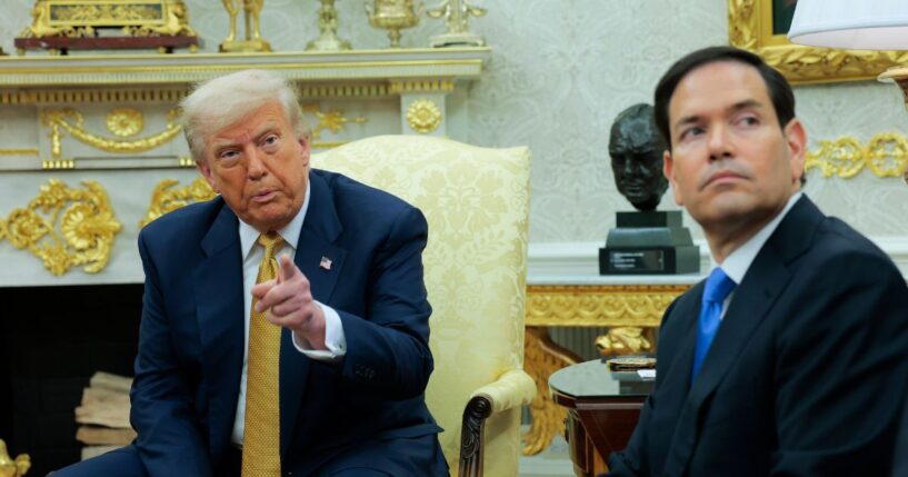 President Donald Trump speaks to reporters as Secretary of State Marco Rubio looks on during a meeting with Crown Prince of Bahrain Salman bin Hamad Al Khalifa in the Oval Office of the White House on July 16, 2025, in Washington, D.C.