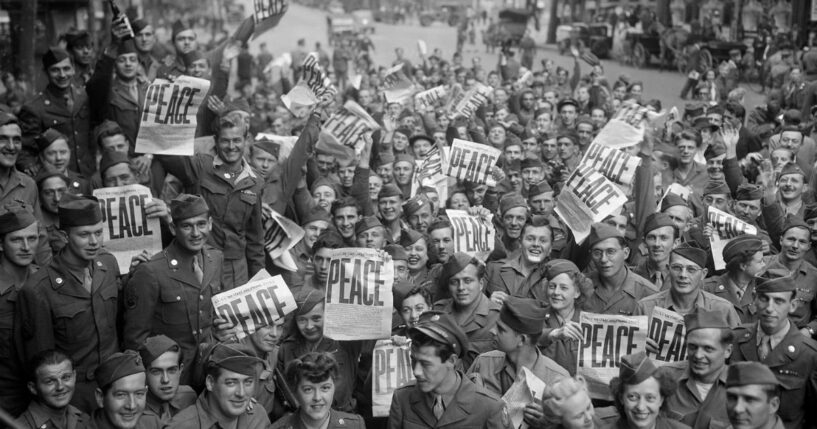 Allied military personnel in Paris, France, celebrate Victory in Japan Day on Aug. 15, 1945.