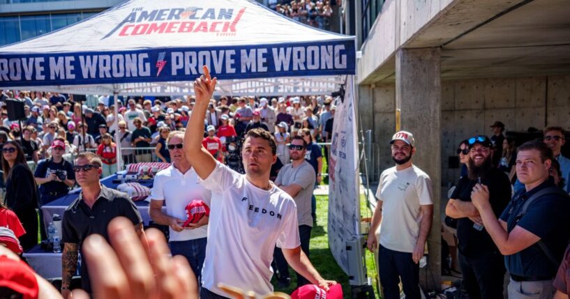 Charlie Kirk throws hats to the crowd after arriving at Utah Valley University on Sept. 10, 2025, in Orem, Utah.