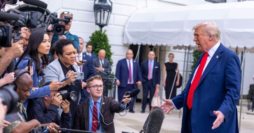 President Donald Trump talks to the media before boarding Marine One on the South Lawn of the White House on Sept. 21, 2025, in Washington, D.C.