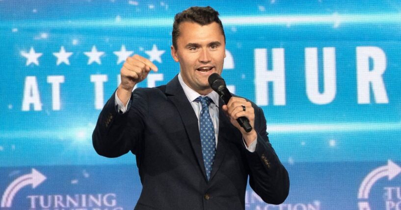 Charlie Kirk speaks on stage ahead of a conversation with then-Vice Presidential candidate J.D. Vance during Turning Point Action's Chase the Vote campaign event at Generation Church in Mesa, Arizona, on Sept. 4, 2024.