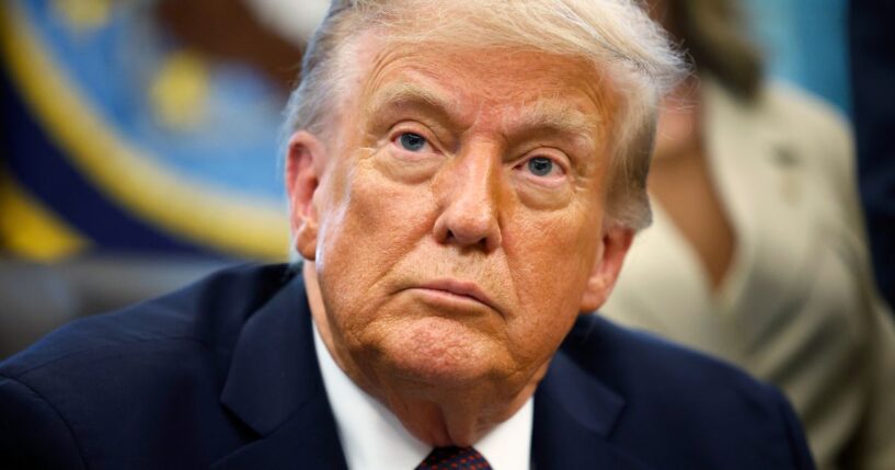 President Donald Trump answers questions from reporters after signing a Presidential Memorandum in the Oval Office of the White House in Washington, D.C., on Monday.