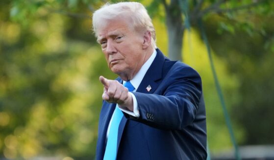President Donald Trump gestures as he departs the White House in Washington, D.C., on Monday.