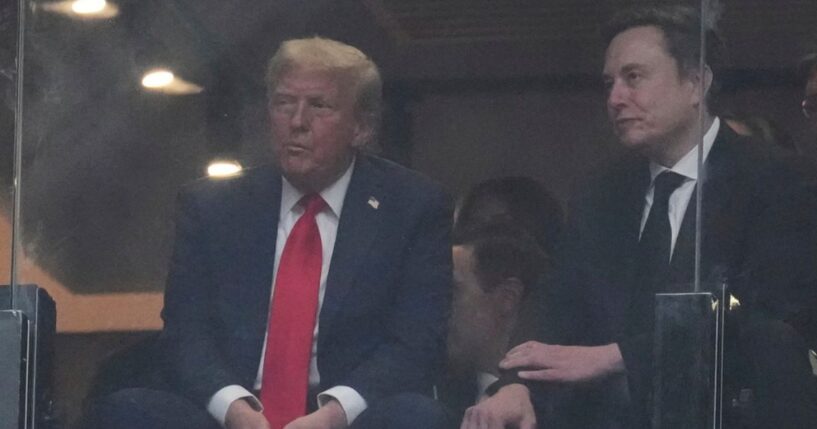 President Donald Trump, left, and Elon Musk, right, listen during a memorial for Charlie Kirk in Glendale, Arizona, on Sunday.