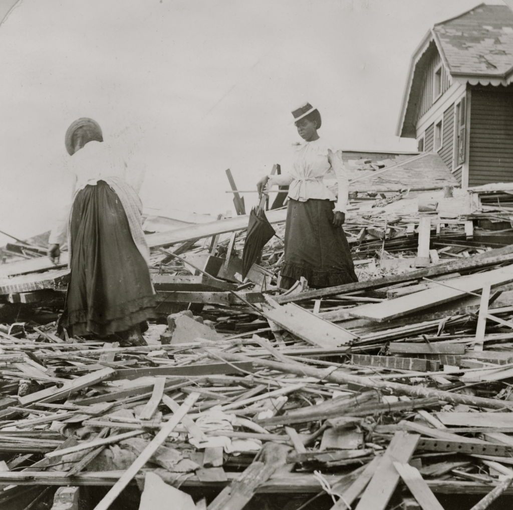 Two Women Navigate the Rubble After the Great Storm
