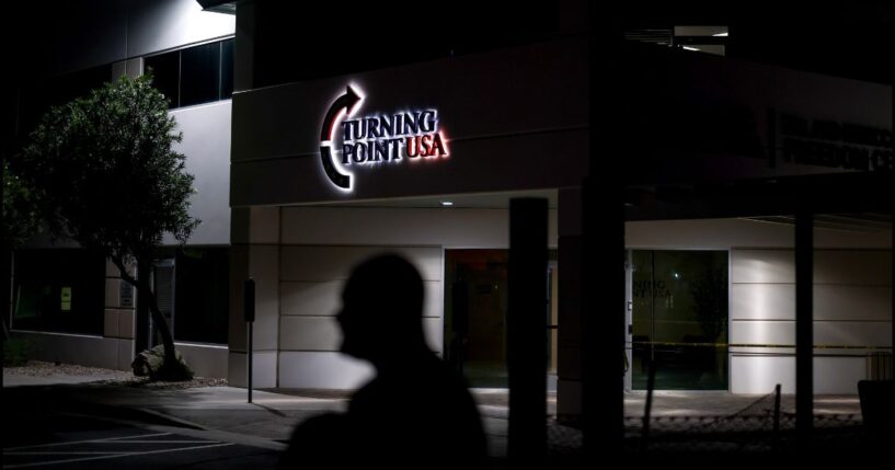 A man stands in front of Turning Point USA headquarter in Phoenix, Arizona, on Sept. 11, 2025.