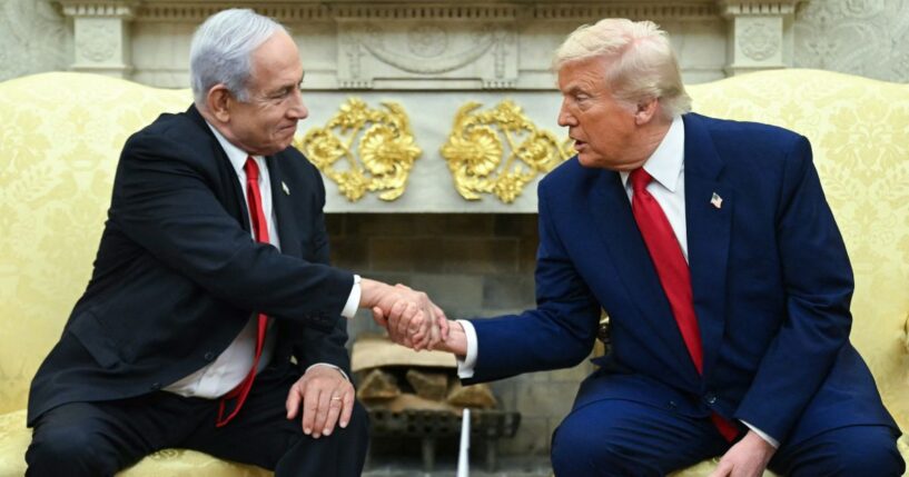 Israeli Prime Minister Benjamin Netanyahu, left, and President Donald Trump, right, shake hands during a meeting in the Oval Office of the White House in Washington, D.C., on April 7.