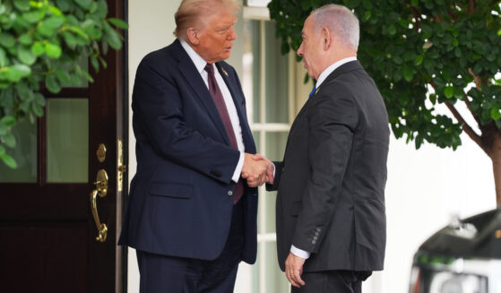 President Donald Trump, left, shakes the hand of Israeli Prime Minister Benjamin Netanyahu, right, at the White House in Washington, D.C, on Monday.