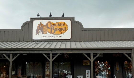 A Cracker Barrel sign featuring the old logo hangs outside of a restaurant on Aug. 27, 2025, in Florida City, Florida.
