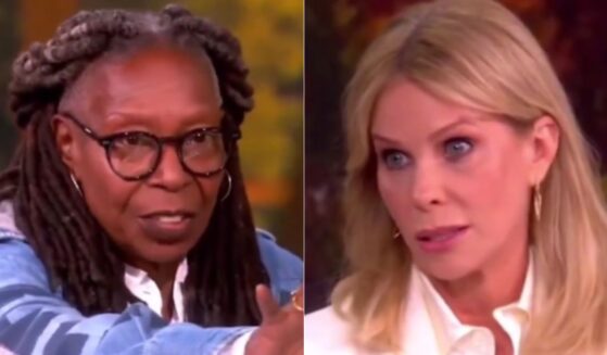 Tuesday on "The View," co-host Whoopi Goldberg, left, cut to a commercial break after Cheryl Hines, right, defended her husband - Health and Human Services Secretary Robert F. Kennedy Jr. - and used former President Barack Obama to make her point.