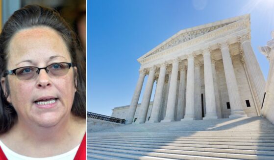 Kim Davis, seen in a file photo from September 2015, makes a statement to the media at the front door of the Rowan County Judicial Center in Morehead, Kentucky. The former Kentucky county clerk who refused to issue marriage licenses to same-sex couples is appealing a ruling ordering her to pay thousands in attorney fees and is asking for the overturning of the Obergefell case that made sames-sex marriage the law of the land.