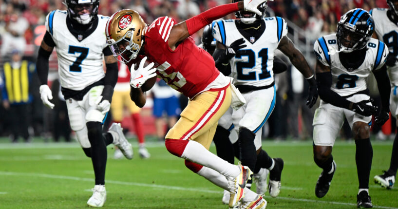 San Francisco 49ers wide receiver Jauan Jennings runs for a touchdown against the Carolina Panthers during the first half an NFL football game on Monday, Nov. 24, 2025, in Santa Clara, California.