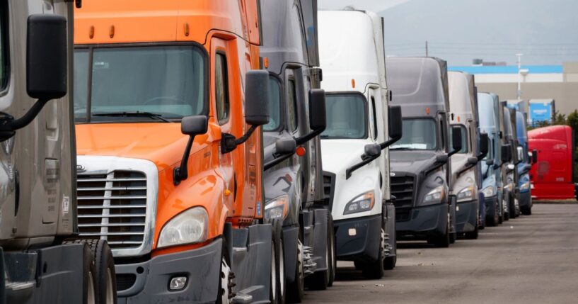 Semitrucks used for shipping are parked near the Otay Mesa Port of Entry on May 3, 2025, in San Diego, California.