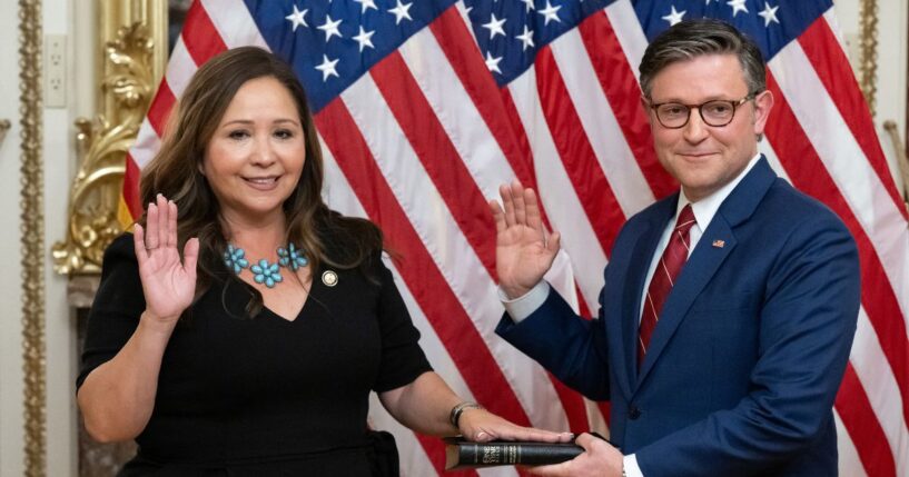 Rep. Adelita Grijalva, a Democrat from Arizona, re-enacts her swearing-in by Speaker of the House Mike Johnson, a Republican from Louisiana, at the U.S. Capitol in Washington, D.C., on Nov. 12, 2025.