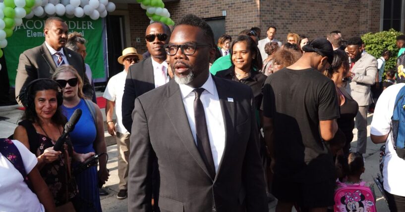 Chicago Mayor Brandon Johnson greets students, parents, and staff during the first day of classes at Beidler Elementary School on Aug. 21, 2023, in Chicago, Illinois.