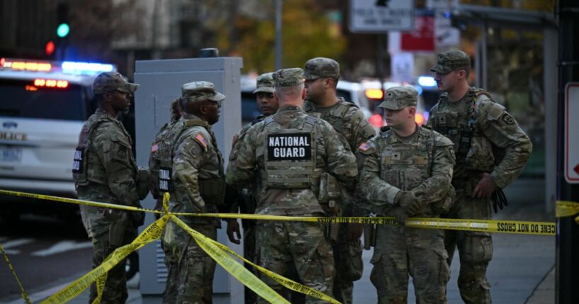 National Guard soldiers gather near a crime scene after a shooting in downtown Washington, D.C., on Nov. 26, 2025.