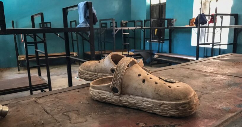 A pair of shoes is seen inside a student dormitory at St. Mary's Catholic School in Papiri, Agwarra local government, Niger state, on Nov. 23, 2025. Fifty of the more than 300 children snatched by militants from a Catholic school in Nigeria have escaped their captors, a Christian group said in a statement.