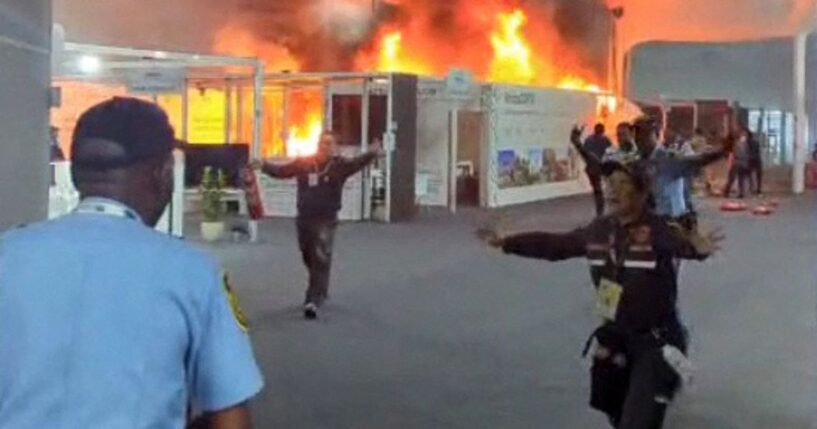 A screen grab taken from AFPTV video footage shows emergency crews battling a fire that broke out Thursday at a pavilion inside the venue of the COP30 UN Climate Change Conference in Belem, Para state, Brazil.
