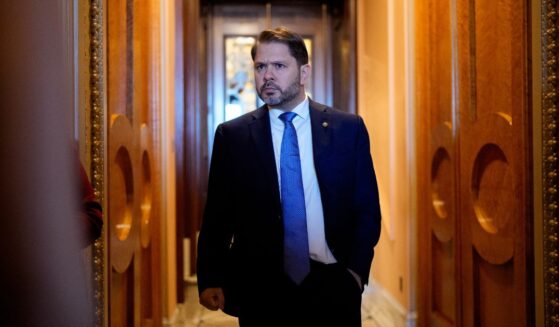 Sen. Ruben Gallego walks out of the Senate Chamber of the US Capitol Building on Oct. 1, 2025.