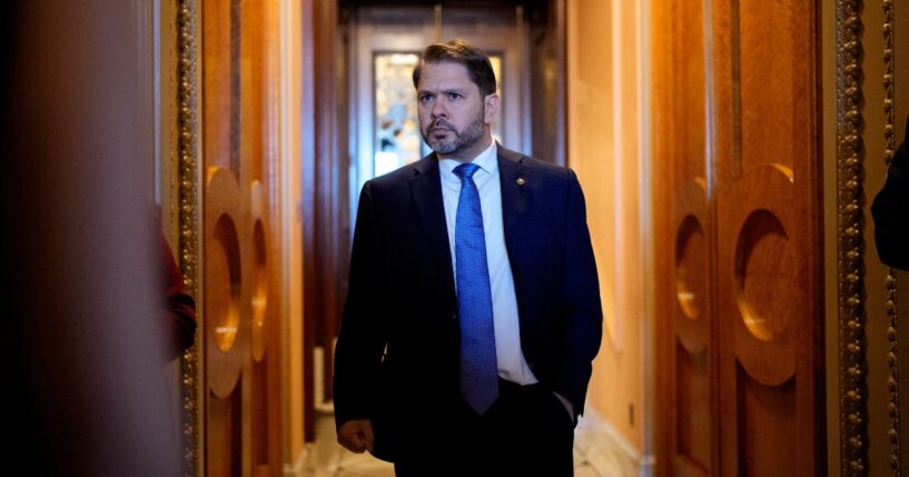 Sen. Ruben Gallego walks out of the Senate Chamber of the US Capitol Building on Oct. 1, 2025.