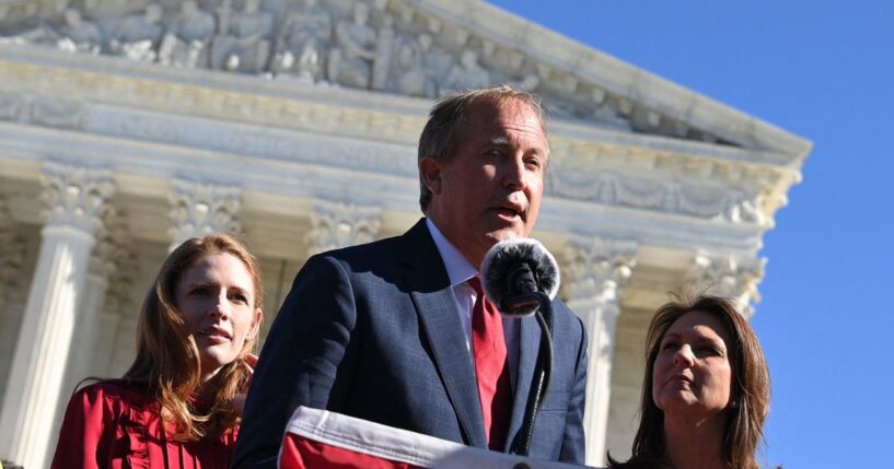 Texas Attorney General Ken Paxton speaks outside the US Supreme Court in Washington, DC on Nov. 1, 2021.