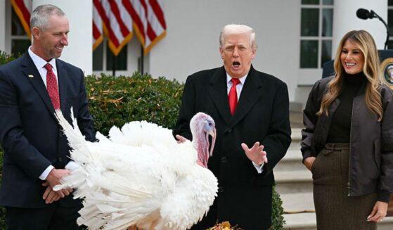 First Lady Melania Trump looks on as President Donald Trump pardons Gobble, one of the National Thanksgiving turkeys, during the White House turkey pardon ceremonyTuesday.